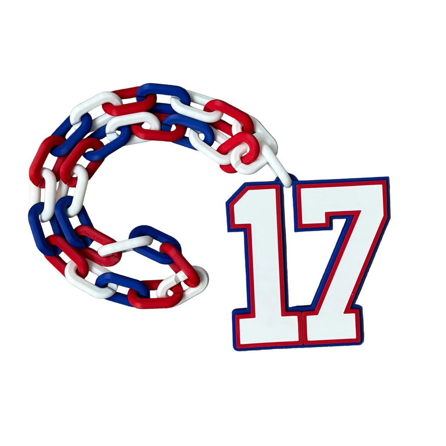 Red, white, and blue chain-like design with number 17 on a gray wooden surface