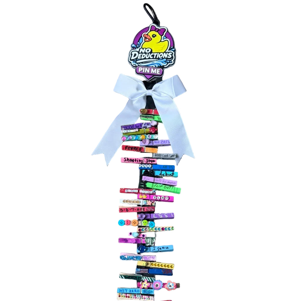 Decorative ribbon with colorful letters on a wooden surface
