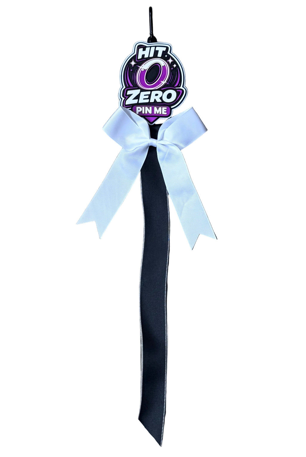 Black ribbon with a white bow and 'HIT ZERO' label on a wooden surface