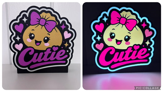 Cheer Dumpling 3D-printed LED lightbox shown illuminated and unlit
