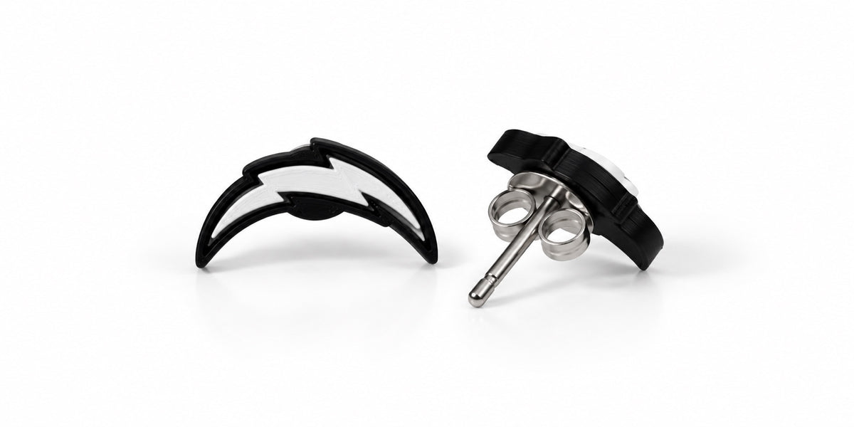 Black and white lightning bolt stud earrings, front and side showing stainless steel post
