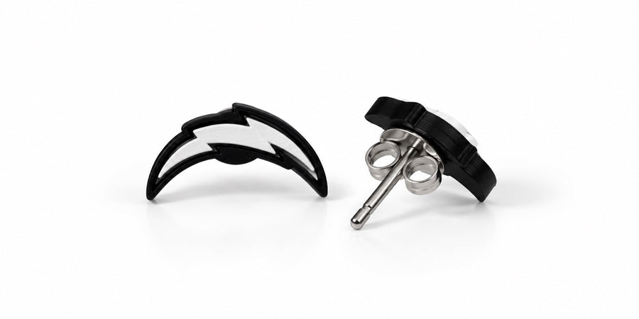 Black and white lightning bolt stud earrings, front and side showing stainless steel post